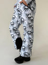 Жіночий теплий ski jumpsuit KRUTYAKOV BLACK WHITE SKULLS з поясною сумкою, капюшоном і ефектним зимовим дизайном